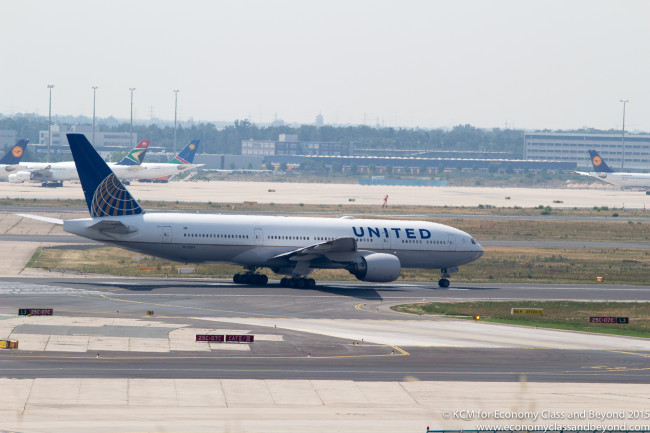 United Airlines Boeing 777-200 preparing to take off from Frankfurt Airport - Image, Economy Class and Beyond.