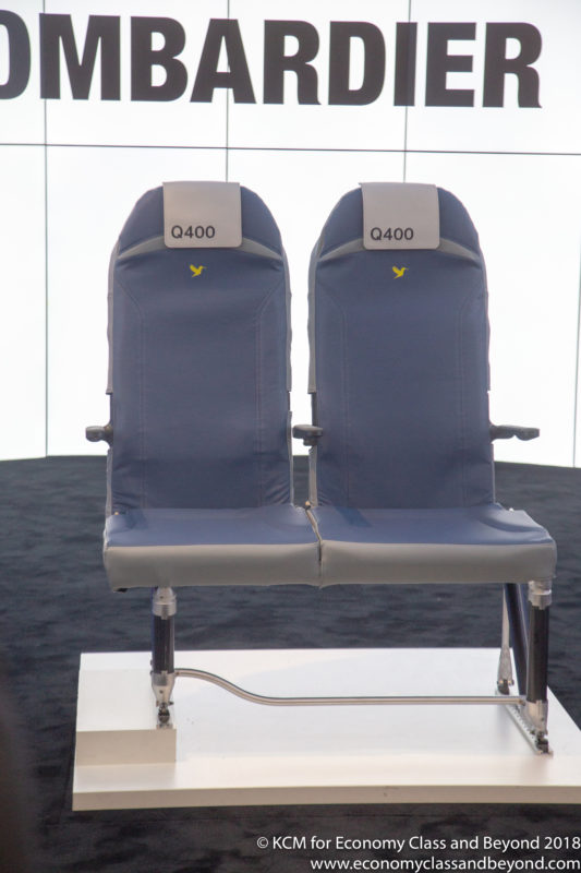 a pair of seats on a stand