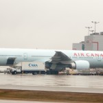a large airplane on a wet runway