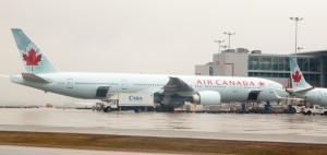 a large airplane on a wet runway