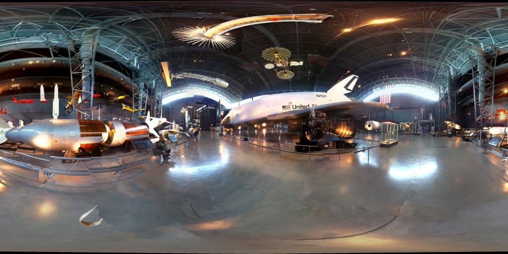 a large room with a large white airplane in it