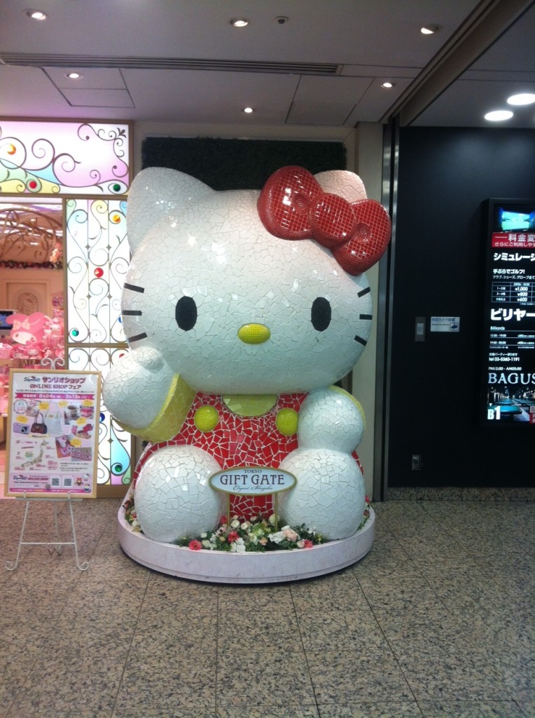 a hello kitty statue in a store