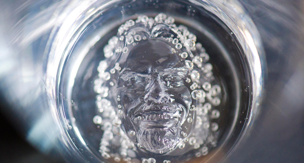 a face in a glass of water