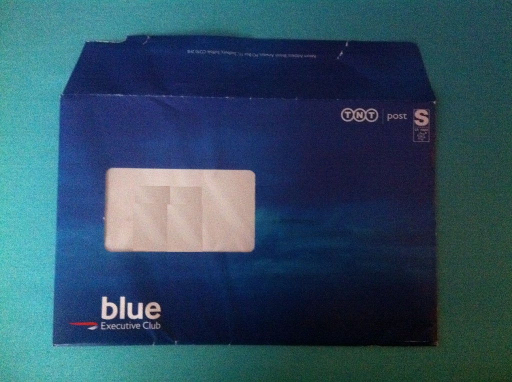 a blue envelope with a white label