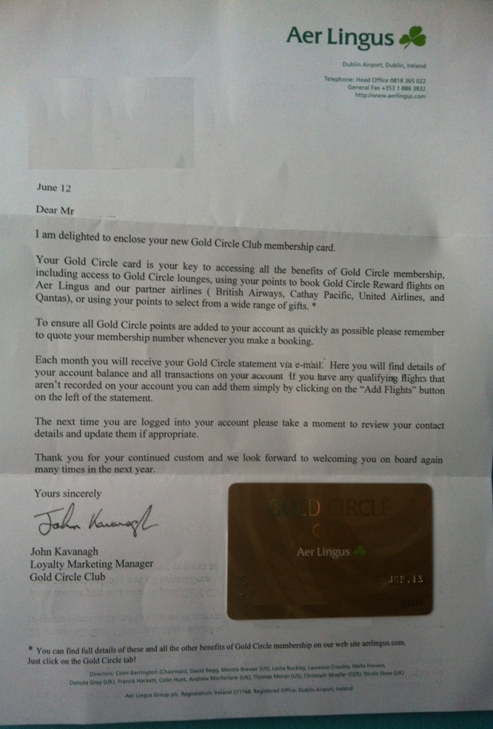 a letter with a gold card on it