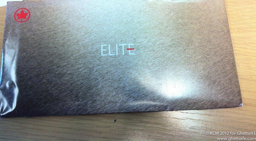 a close up of a silver envelope