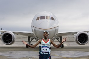 a man in front of an airplane