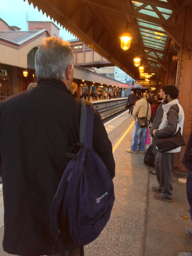 a group of people at a train station