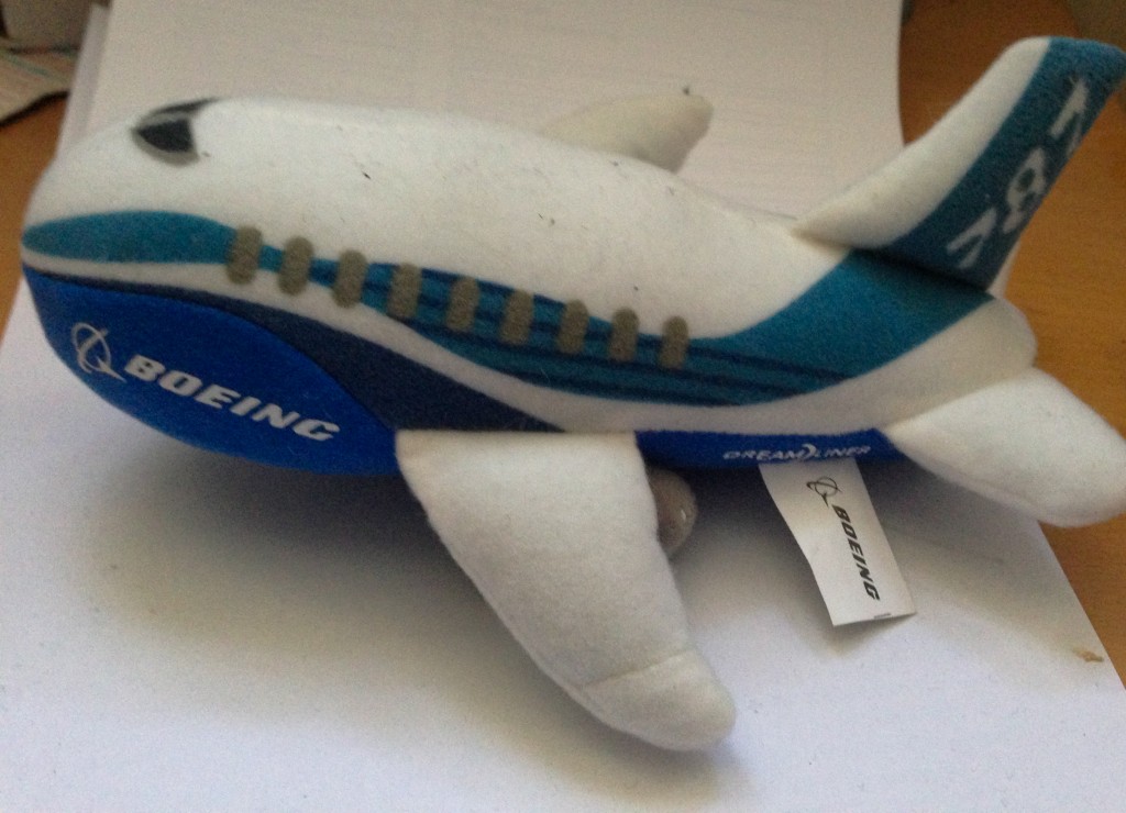 a stuffed toy airplane on a table