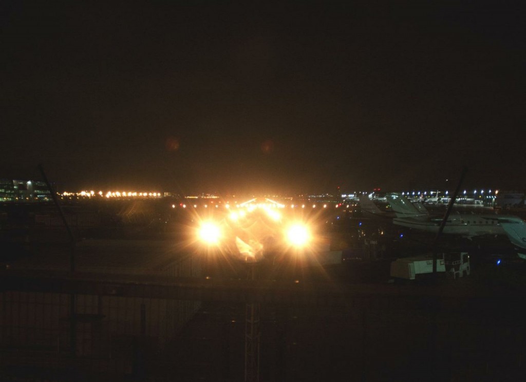 a group of airplanes at night