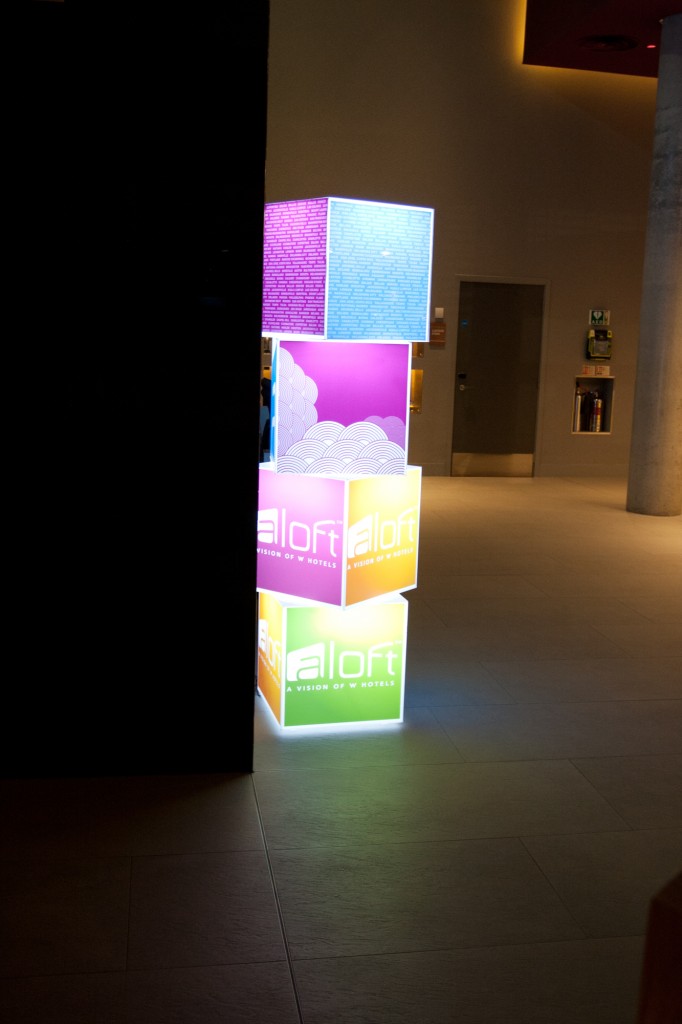 a group of colorful cubes in a room