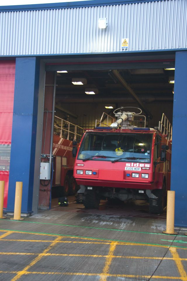 a fire truck in a garage