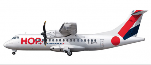 a white airplane with a propeller