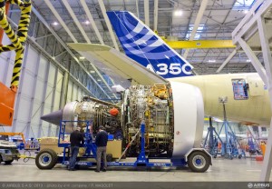 a plane engine in a hangar