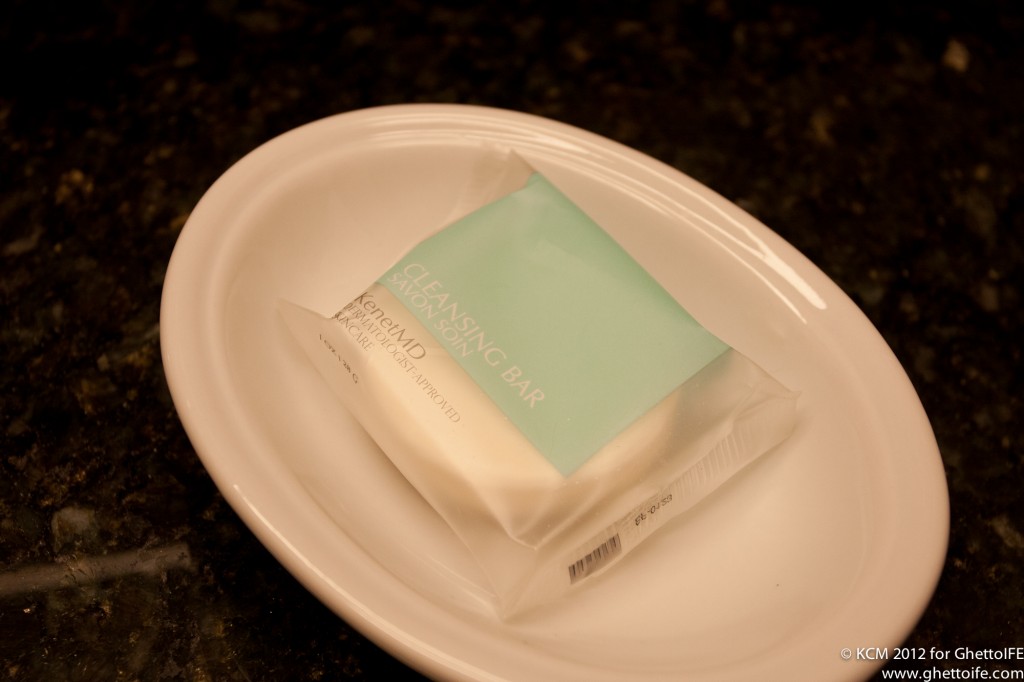 a white plate with a package of soap on it