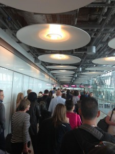a group of people standing in a hallway