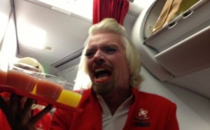 a man holding a tray of juice