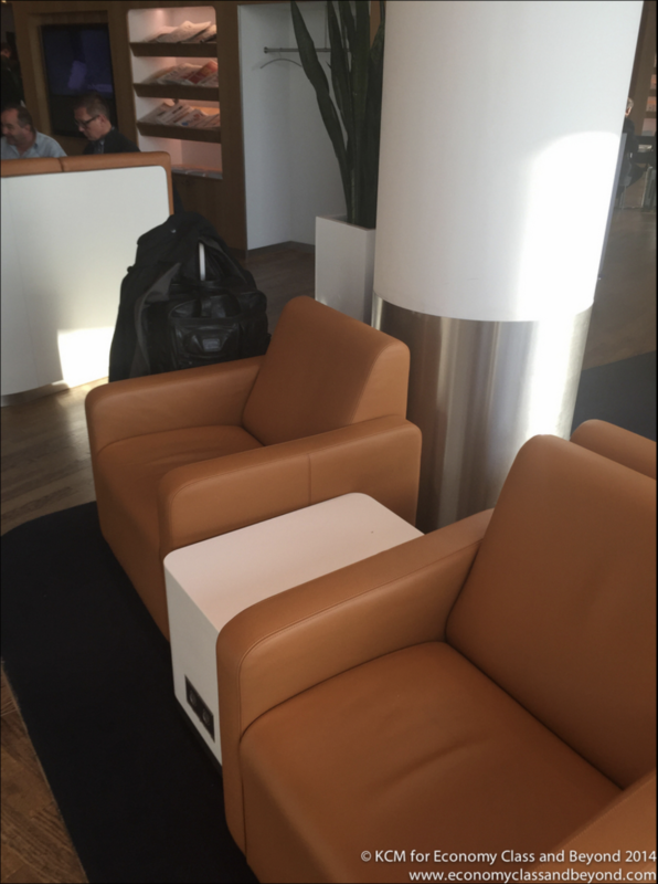 a brown leather couches in a room