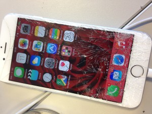 a broken cell phone with a screen