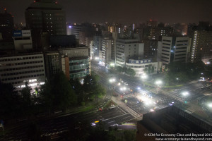 a city at night with many buildings