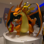 a statue of a dragon and a cartoon character