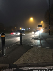 cars on a street at night