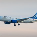 Bombardier CSeries landing in the sunset - Image, Bombardier