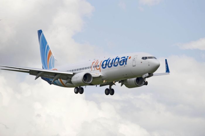 flydubai Aircraft in flight with wheels down - Image, flydubai