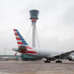 American Airlines Boeing 777 taxing with Heathrow Tower in the background - Image, Economy Class and Beyond
