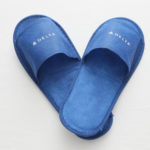 a pair of blue slippers