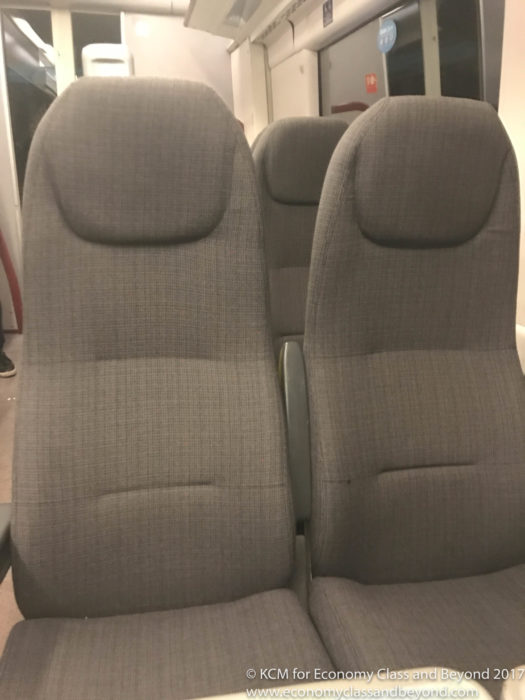 a group of grey seats