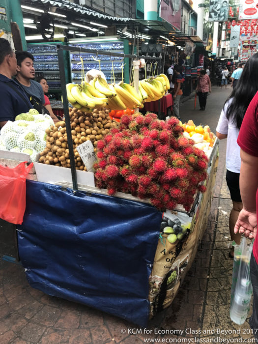 a fruit stand on the street
