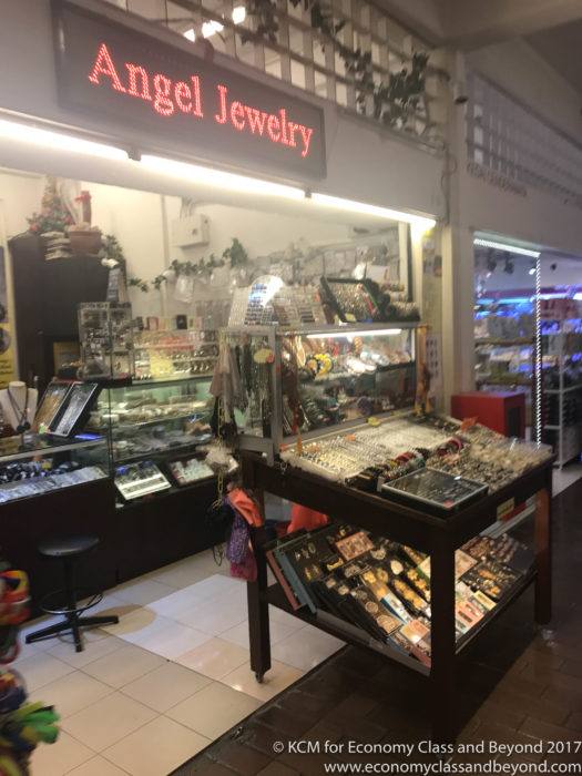 a store with a display of jewelry