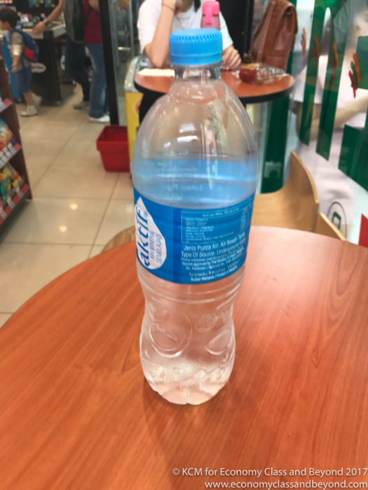 a bottle of water on a table