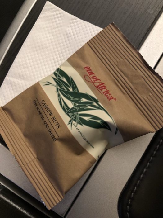 a brown bag with green leaves on it