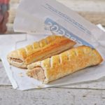 a sausage roll on a paper