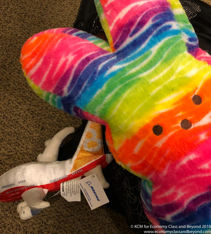 a rainbow colored stuffed animal