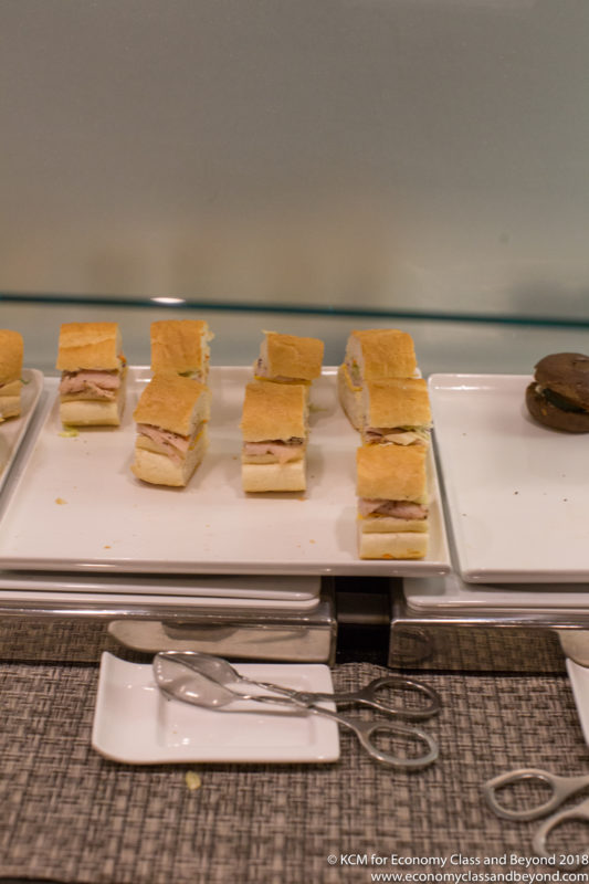 a group of sandwiches on a tray