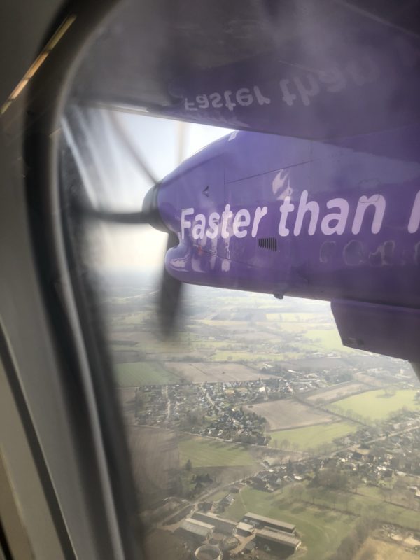 a purple plane with white text