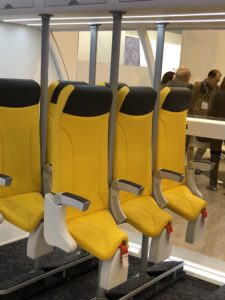 a row of yellow chairs