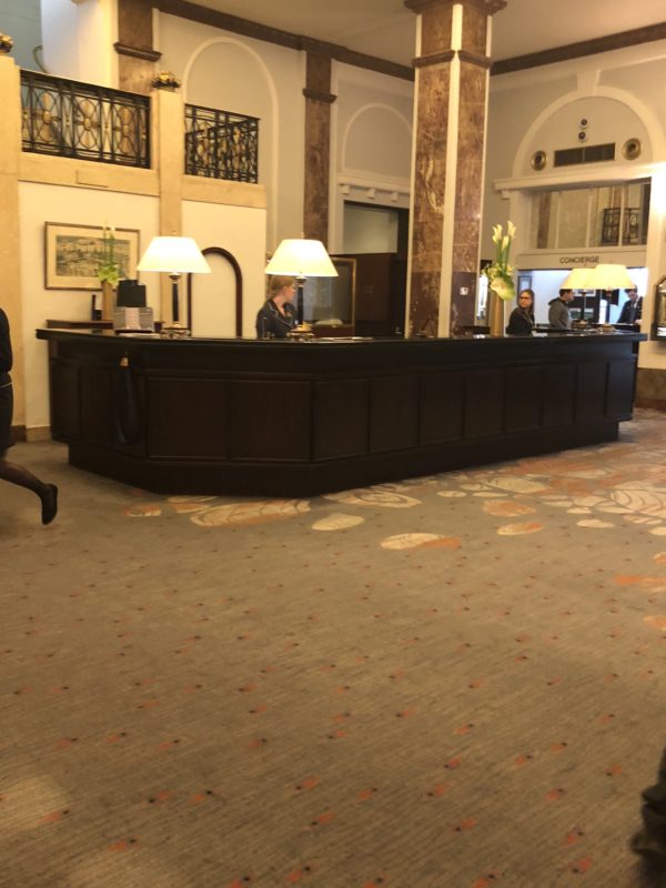 a reception desk in a hotel