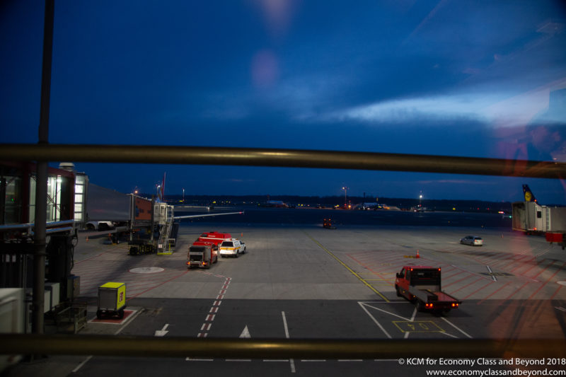 a view from a window of an airport at night