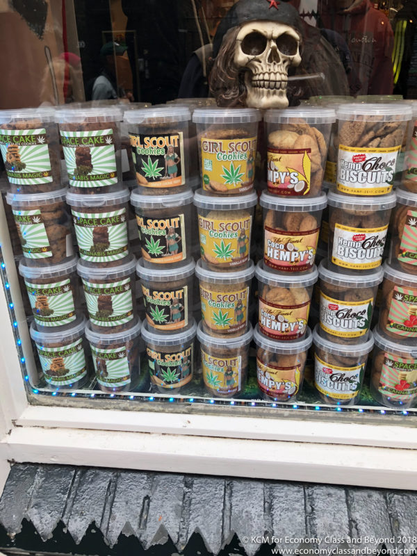 a display of cookies in plastic containers