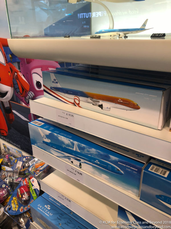 a group of model airplanes on a shelf