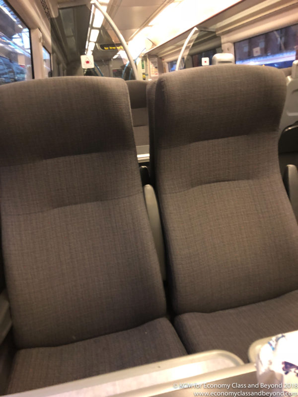 a pair of seats on a bus