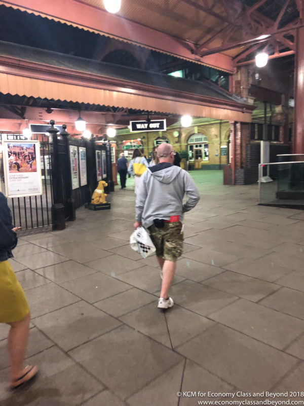 a man walking in a train station