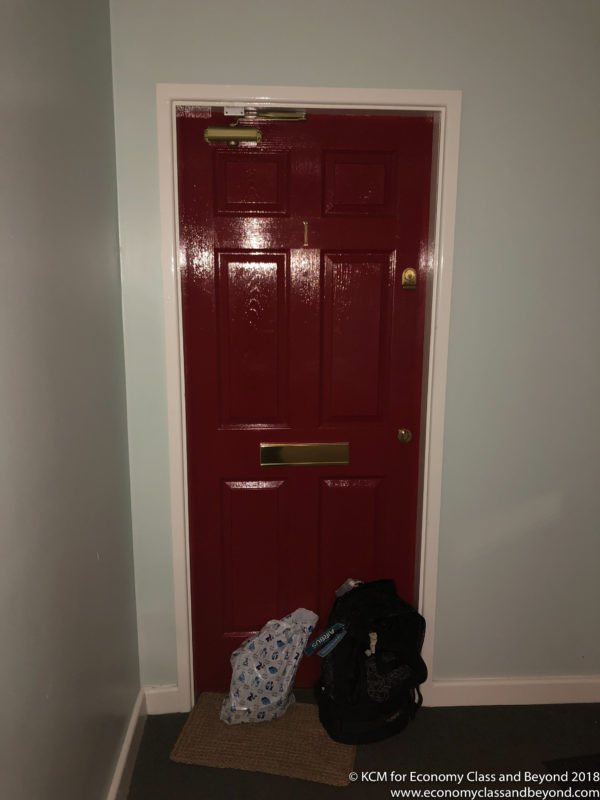 a red door with a white frame