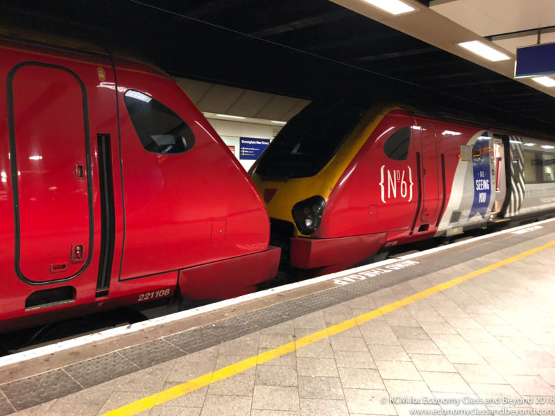 a red trains in a station