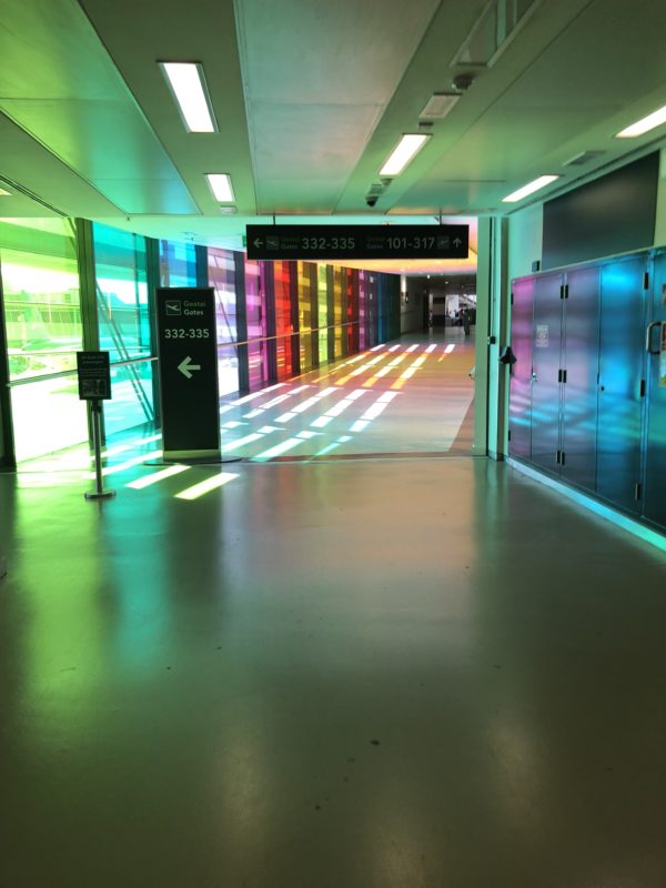 a hallway with colorful lights
