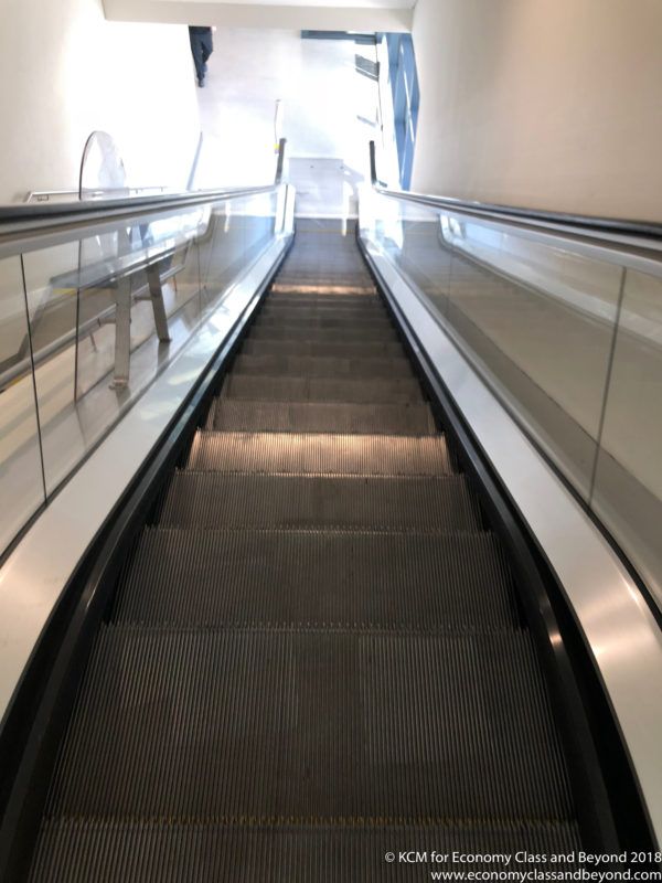 a escalator going down a building